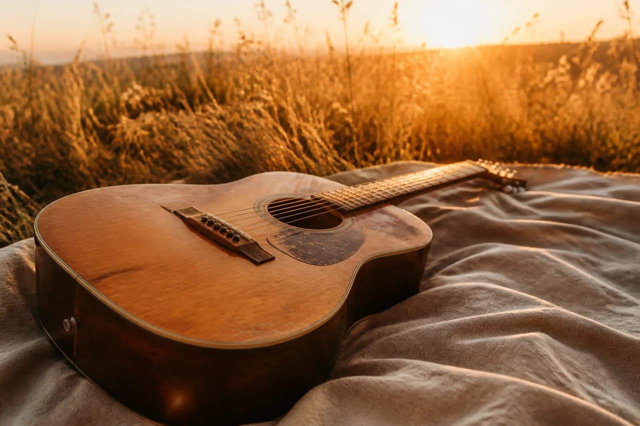 A musician surrounded by soft golden evening light
